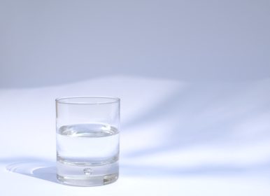 clear drinking glass filled with water